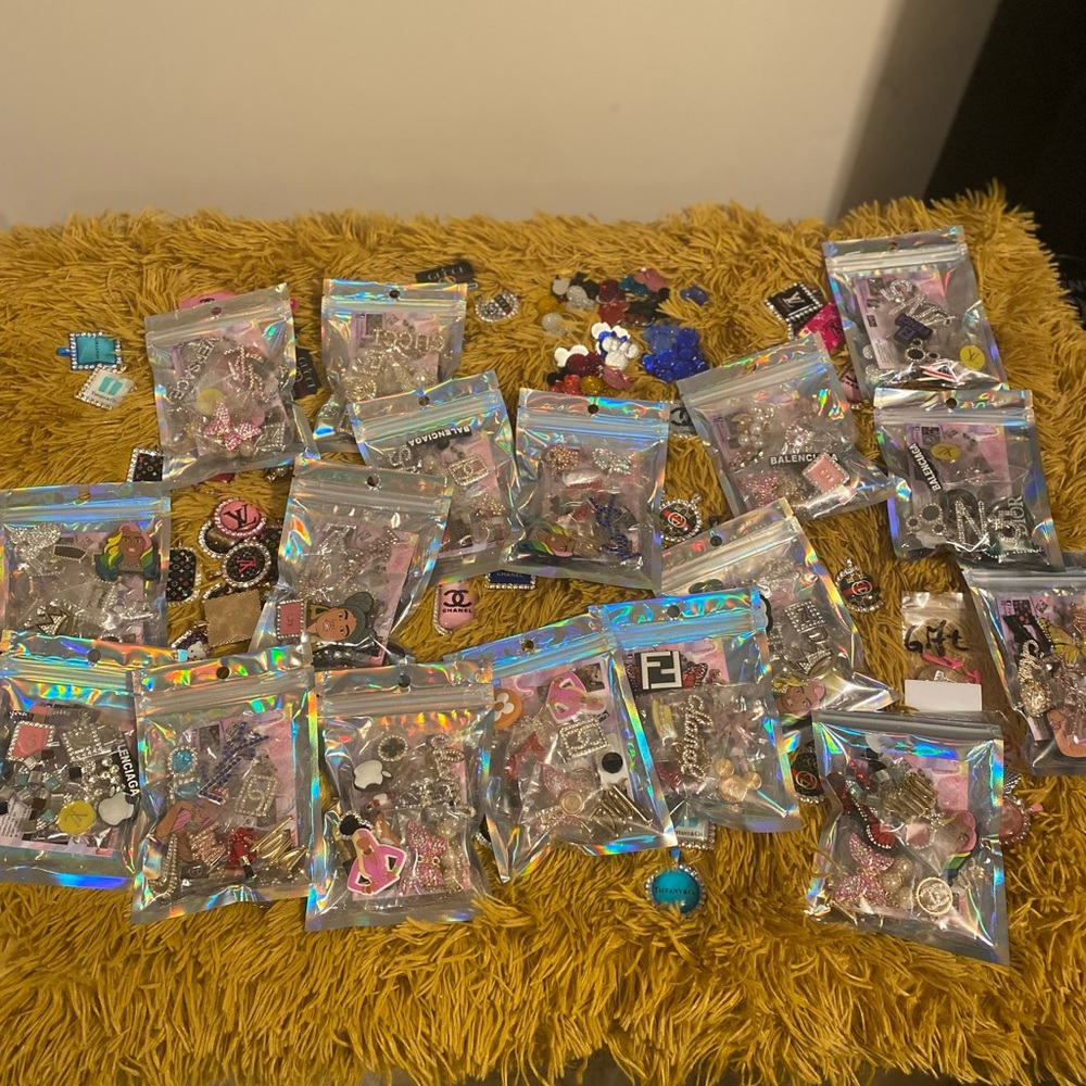 (2) 10 pc Random Croc Charm Bundles.. designer Charms included in each bundle.